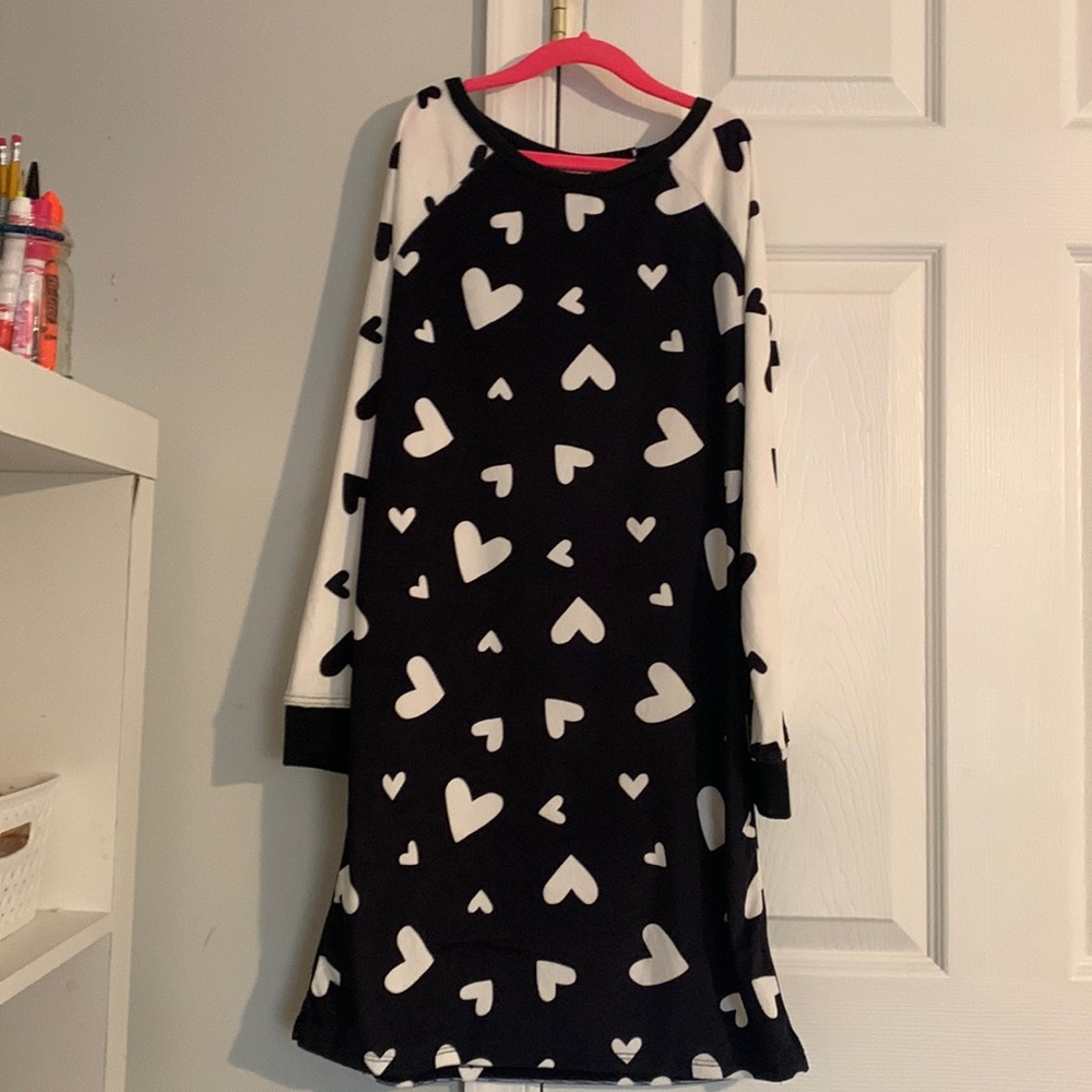I am selling a white and black,heart design pajama dress.